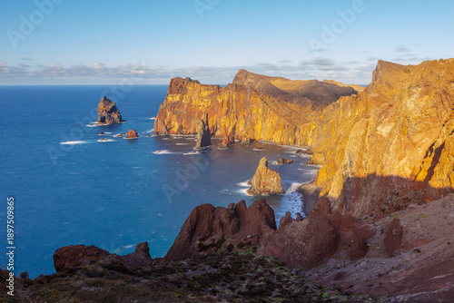 Sunset over the bare cliffs of the volcanic peninsula of Ponta de São Lourenço at the east-coast of the isle of Madeira, Portugal
