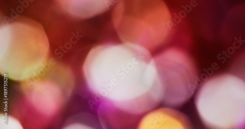 Bokeh texture. Light flare. Blur purple orange yellow color optical gleam round visual glare luminous glint on abstract art background.