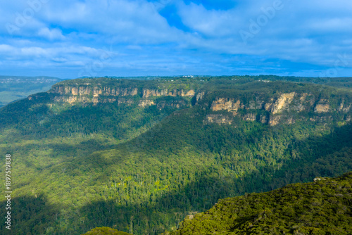 Drone aerial photograph of a large cliff face in the Jamison Valley near the town of Wentworth Falls in the Blue Mountains in New South Wales, Australia.