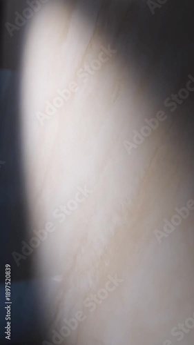 Subtle Light Beam Gliding Over A Textured Wall Creating A Serene And Modern Aesthetic Background
