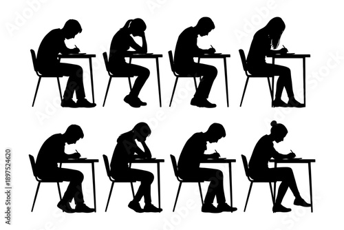 Silhouette of students writing exams at desks.
