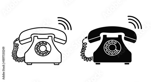Two vintage rotary phones one white and one black silhouette
