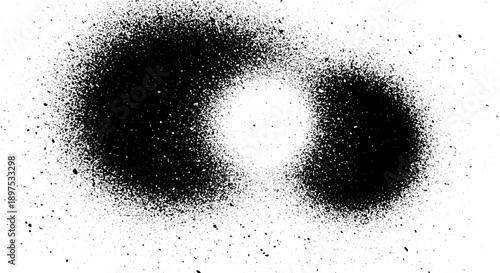 Abstract black spray paint splatters forming a unique shape on white background.