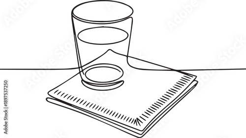 A glass and notebook are on a table, simple line drawing from a 3/4 view