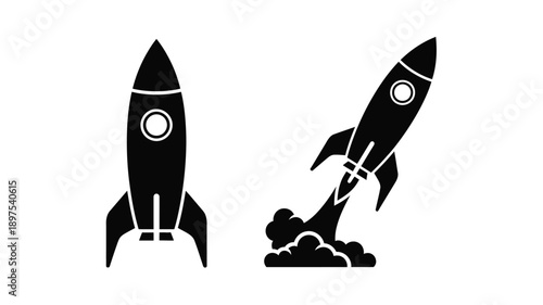 Two rocket ships one launching with fiery exhaust in silhouette