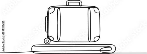 Suitcase and trolley on the ground viewed from the side