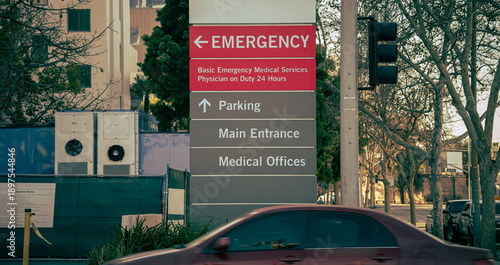 Fotografie Hospital emergency entrance sign with directions to parking and medical offices