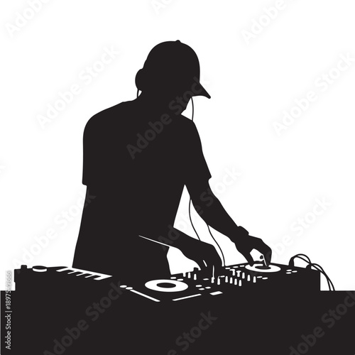 DJ mixing music in silhouette style with dramatic black and white lighting on electronic equipment for music production