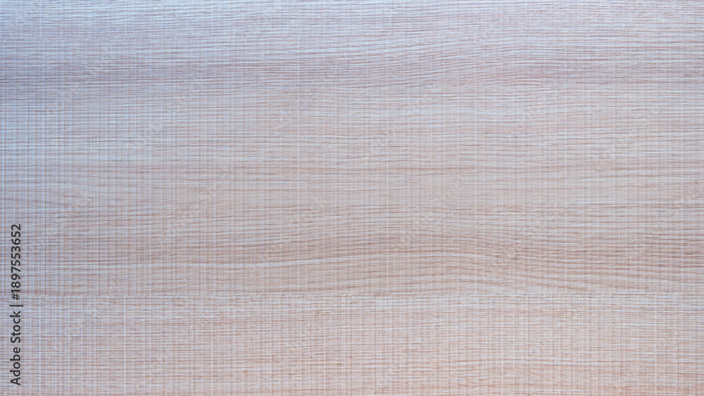 Fototapeta premium Wooden surface with a pattern of lines and dots. The surface is light in color and has a somewhat rough texture