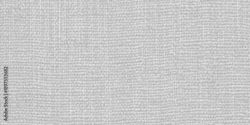 A seamless blend of gray and white cotton fabric textures creates a natural woven canvas pattern with a rough linen material surface, featuring a closeup fiber design on this textile backdrop