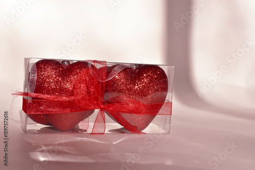 Gift box with artificial heats on white background, love concept. St.Valentines Day background. Wedding background