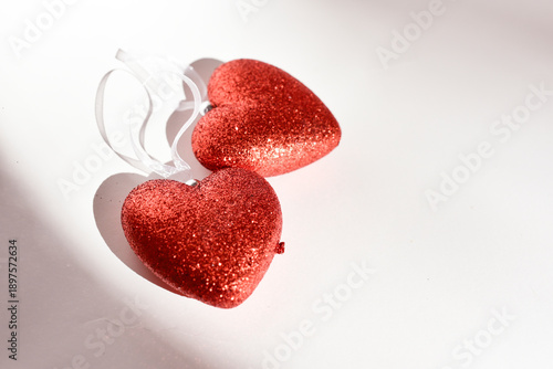 Two heats on white background, love concept. St.Valentines Day background. 