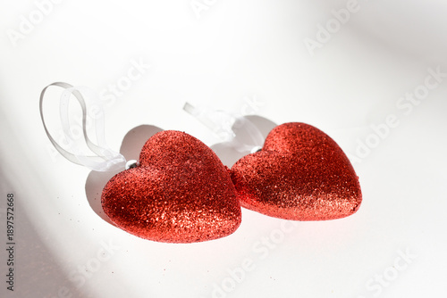 Two heats on white background, love concept. St.Valentines Day background. 