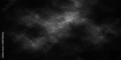 Dramatic dark storm clouds swirl through a black and white smoke texture creating an abstract overcast sky backgrounds with a touch of lightning under a moody night heaven