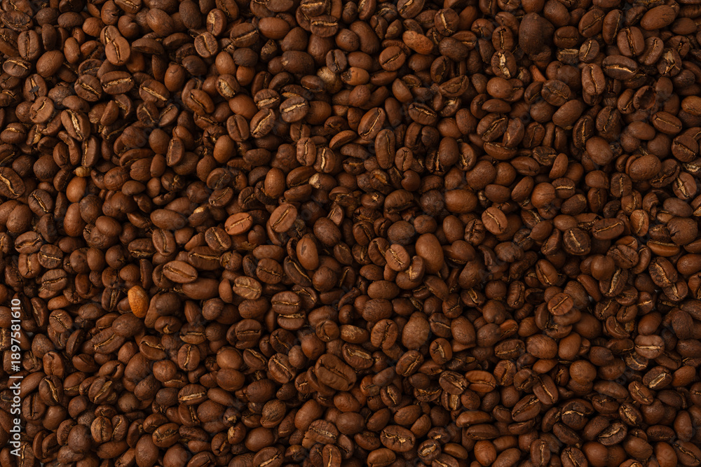 Fototapeta premium Coffee beans on a white background. Coffee beans texture.
