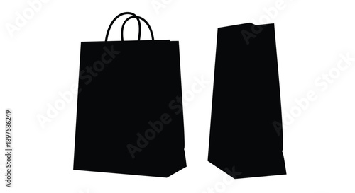 Two black paper shopping bags against a white background silhouette
