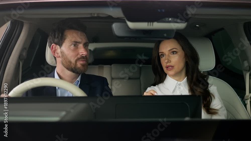 Caucasian woman car dealer saleswoman consulting man client buyer new automobile female consultant girl help talking male guy choose luxury auto sit inside choosing buy in salon rent service showroom