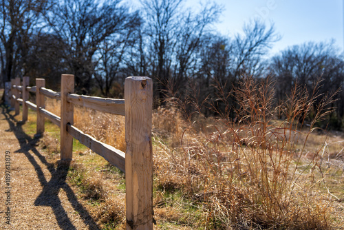 wooden fence in a field