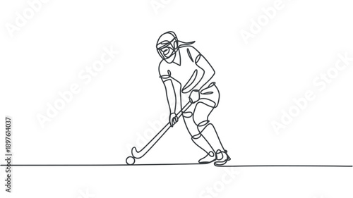 A female field hockey player in action, skillfully hitting the ball with her stick in a dynamic pose.
