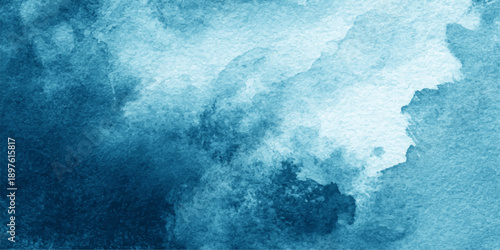A dark blue abstract grunge background with a motion of smoke and clouds blending into a textured mist of night sky and deep ocean water