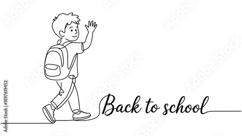 A happy young boy with a backpack waves goodbye as he heads back to school