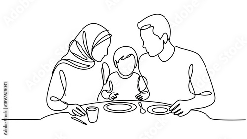 A family with a young child sitting at a table together for a meal