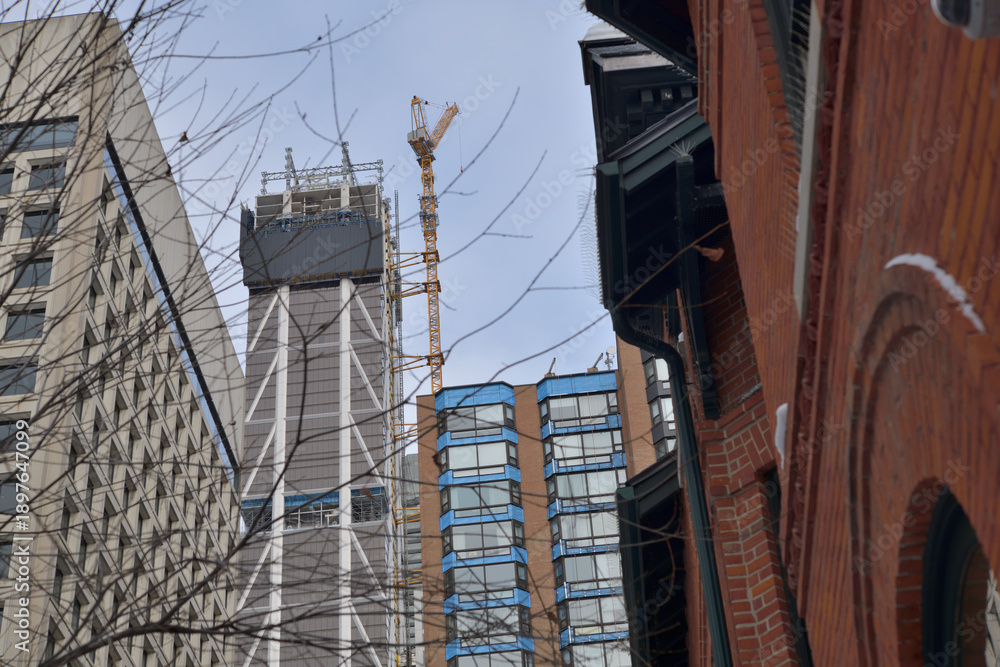 Fototapeta premium looking up at buildings incl One Bloor West (under construction) from Sultan St and St Thomas St (Bloor Yorkville area), Toronto