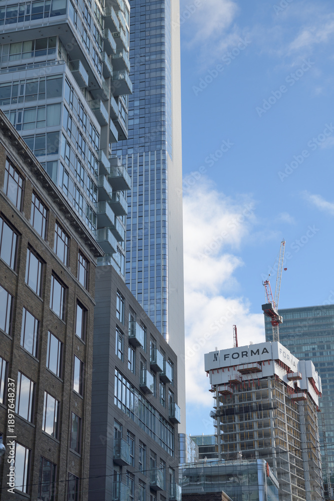 Obraz premium FORMA condo complex under construction at Duncan St and King St W, Toronto