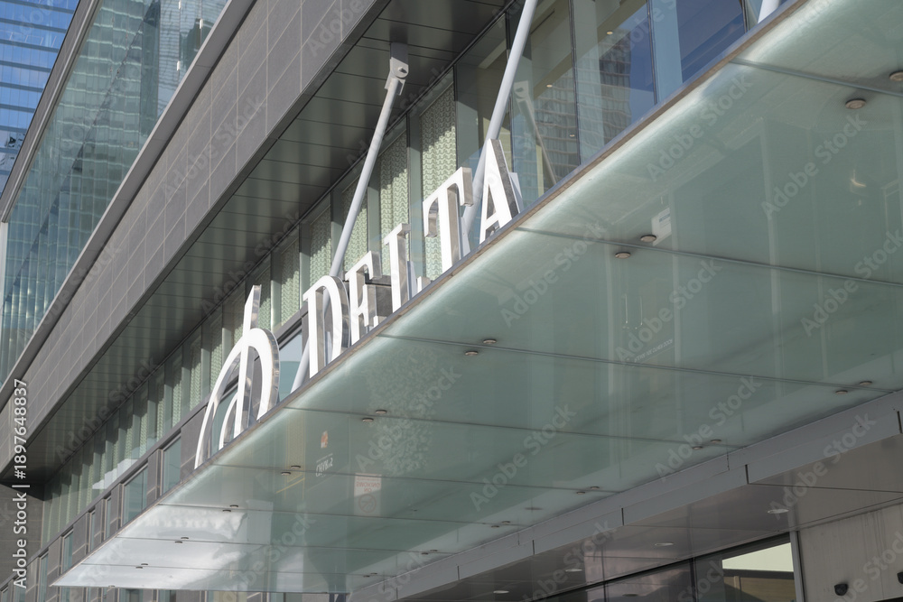 Fototapeta premium sign over front entrance to Delta Hotel located at 75 Lower Simcoe St, Toronto - 
