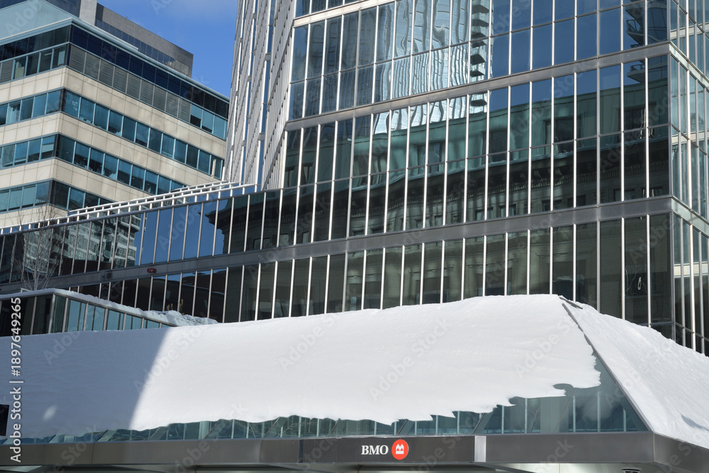 Fototapeta premium BMO Bank of Montreal sign on canopy outside 200 King St W, Toronto