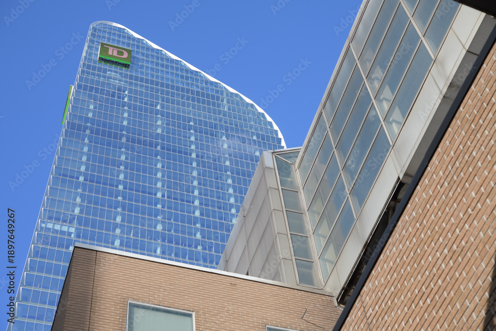 Obraz premium skyward view of TD Terrace and old building at southeast corner of Simcoe St and Front St W, Toronto