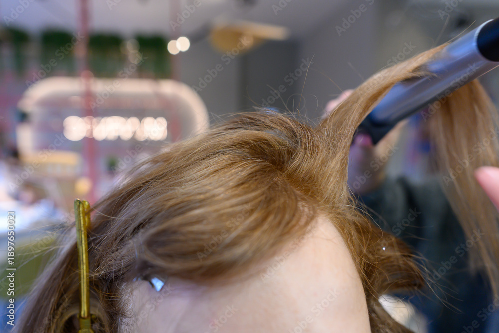 Fototapeta premium Creative hairstyling session in a modern beauty salon