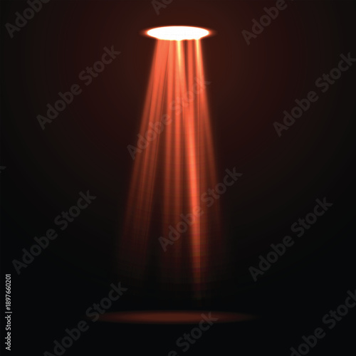 A beam of light shining down in the darkness