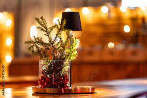 Christmas table decoration with festive holiday ornaments
