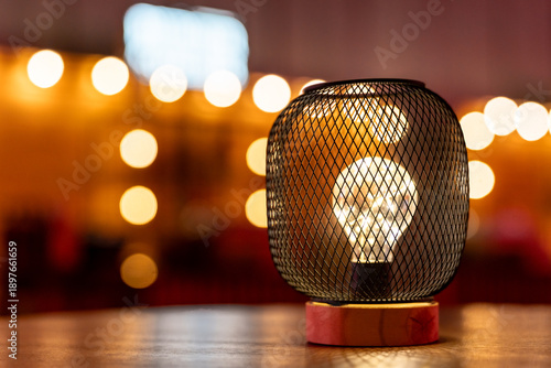 Cozy light bulb lamp creating warm night ambiance