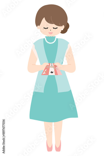 結婚式でご祝儀袋を渡す女性