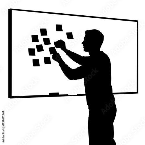 Man interacting with digital interface on large screen.