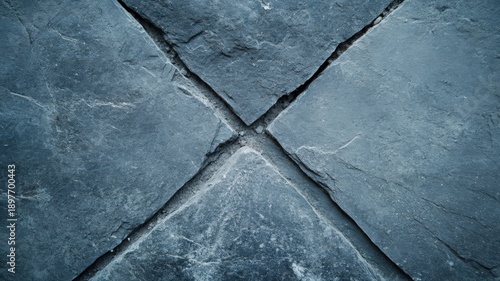 Top Down Macro View of a Rough Industrial Concrete Floor with Cracks and Textural Details