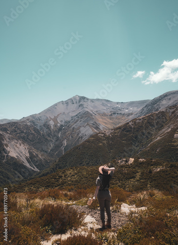 New Zealand Mt Hutt South Island Woman hiker overlooks mountain in summer adventure solo travel female traveler nz tourism wanderlust