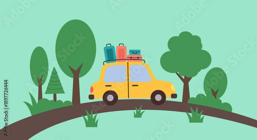 Yellow car driving on a winding road through a green forest with luggage on the roof.