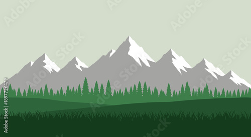 Serene mountain landscape with snow-capped peaks and lush green forest.