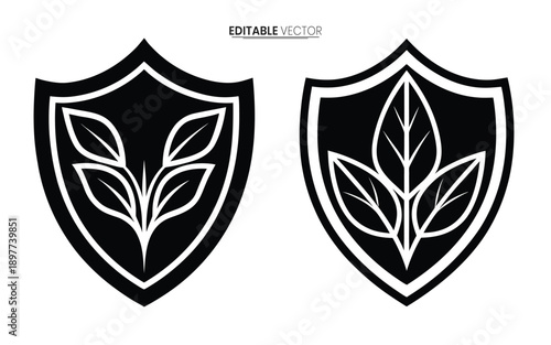 Two black shield emblems featuring stylized leaf designs presented as editable vector graphics high quality
