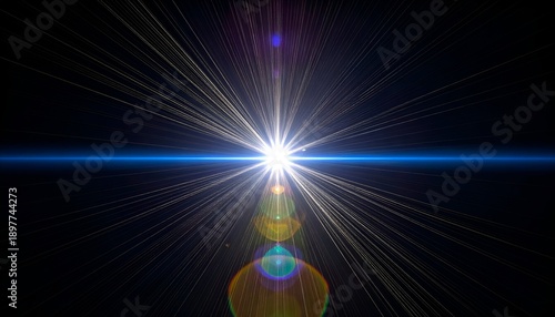 Intense bright light source emanating starburst rays on a black background