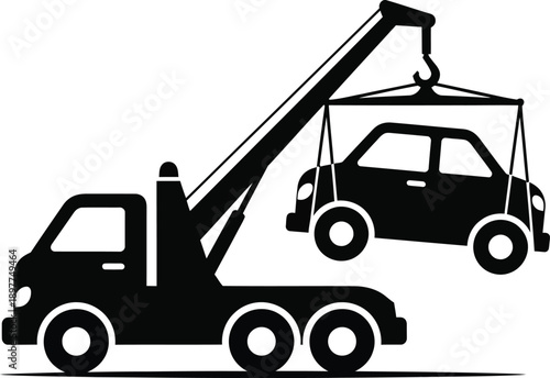 Silhouette of a heavyduty tow truck with a crane lifting a suspended passenger car.