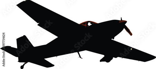 Silhouette of a small airplane flying against vibrant orange sky