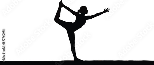 Woman practicing yoga in nature at sunset with vibrant orange sky