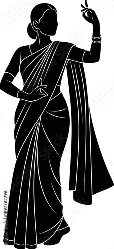Silhouette of female indian classical dancer performing traditional mudra in saree