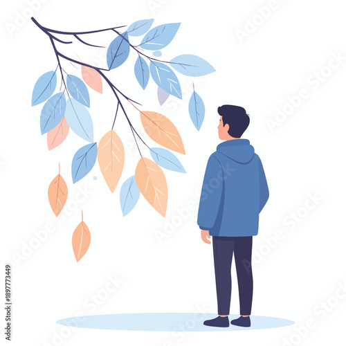 A man standing under a tree branch with falling leaves in autumn from behind