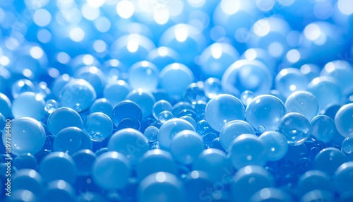 A serene ocean of blue spheres viewed from a close-up perspective, surrounded by soft, blurred light