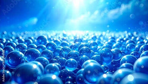 A vast array of blue spheres illuminated by a bright light from above, creating a visually striking scene